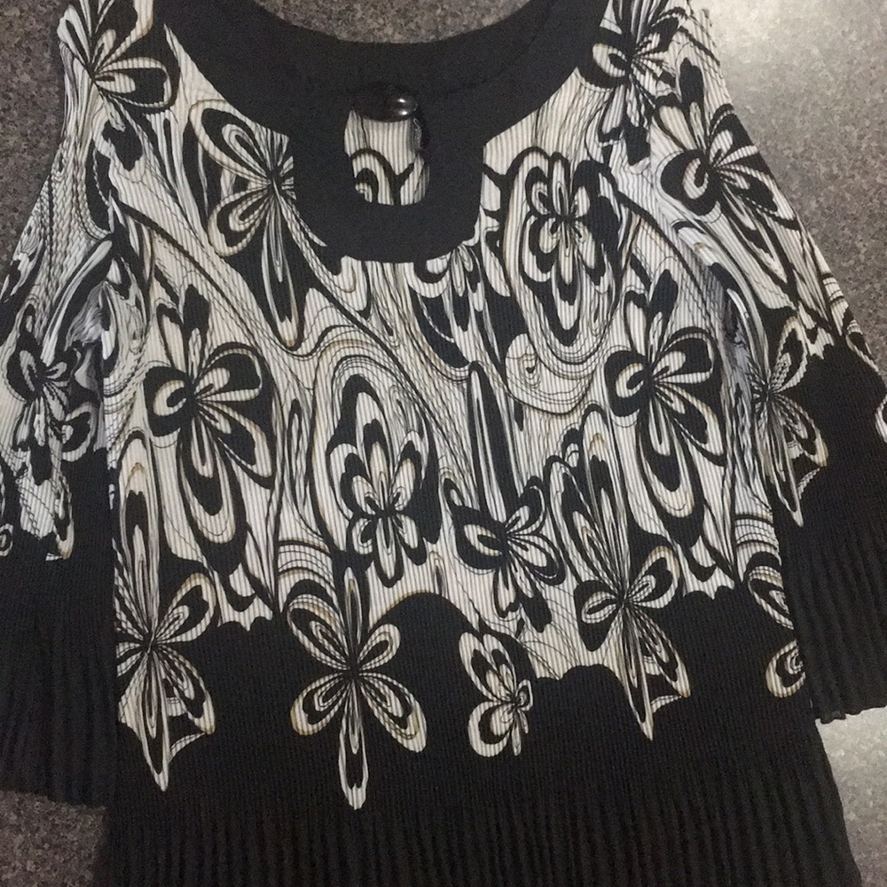 Pleated blouse with bell sleeves